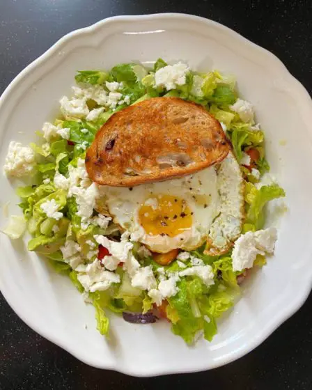 Creamy Turkish feta cheese salad with sunny side up egg and olive toast