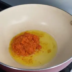 Frying achar paste in oil