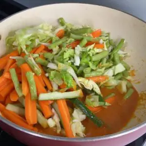 Add vegetables to achar