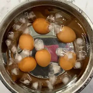 cool eggs in ice water