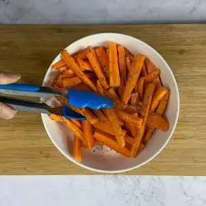 mix seasoning with carrot fries