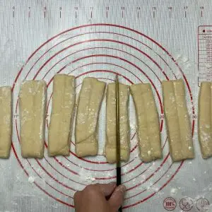 press the dough with stick